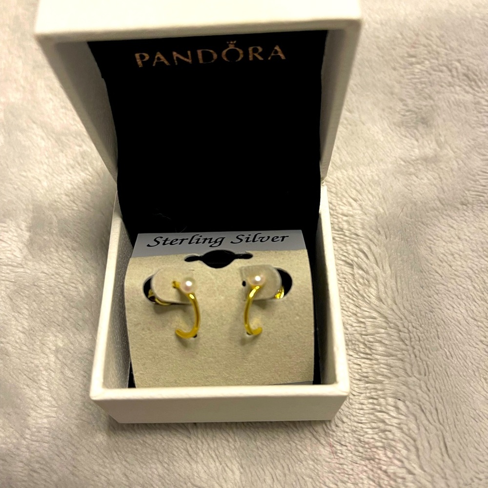 Sterling gold hoop earrings with a pearl